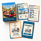 HOPABOUT London box with Tower Bridge, itinerary, Red Rose train and blue journey-backed cards.