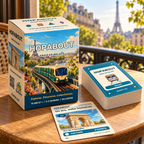 HOPABOUT Paris en balade box, journey deck and Arc de Triomphe postcard card on a table overlooking Paris.
