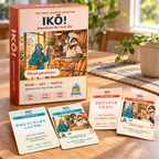 IKŌ! Japanese card game box with four matching phrase and illustrated bakery cards on a wooden table.