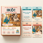 IKŌ! Japanese game box beside four cards showing greetings, ordering a croissant and illustrated bakery scenes.