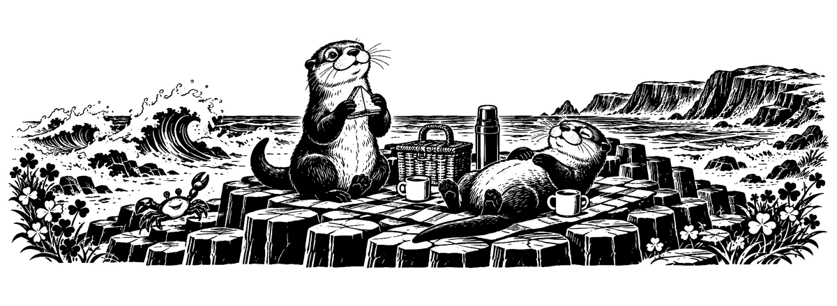 Causeway Otter Picnic - flat black-and-white panoramic laser engraving artwork. Two otters share a seaside picnic among hexagonal basalt columns, with a blanket, basket, waves and coastal foliage.